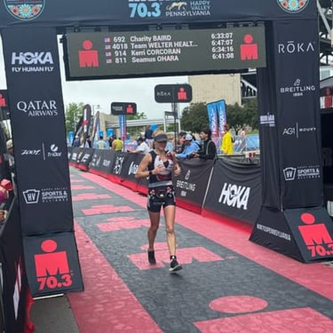 Triathlete at an Ironman 70.3 finish